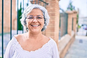 smiling woman with glasses